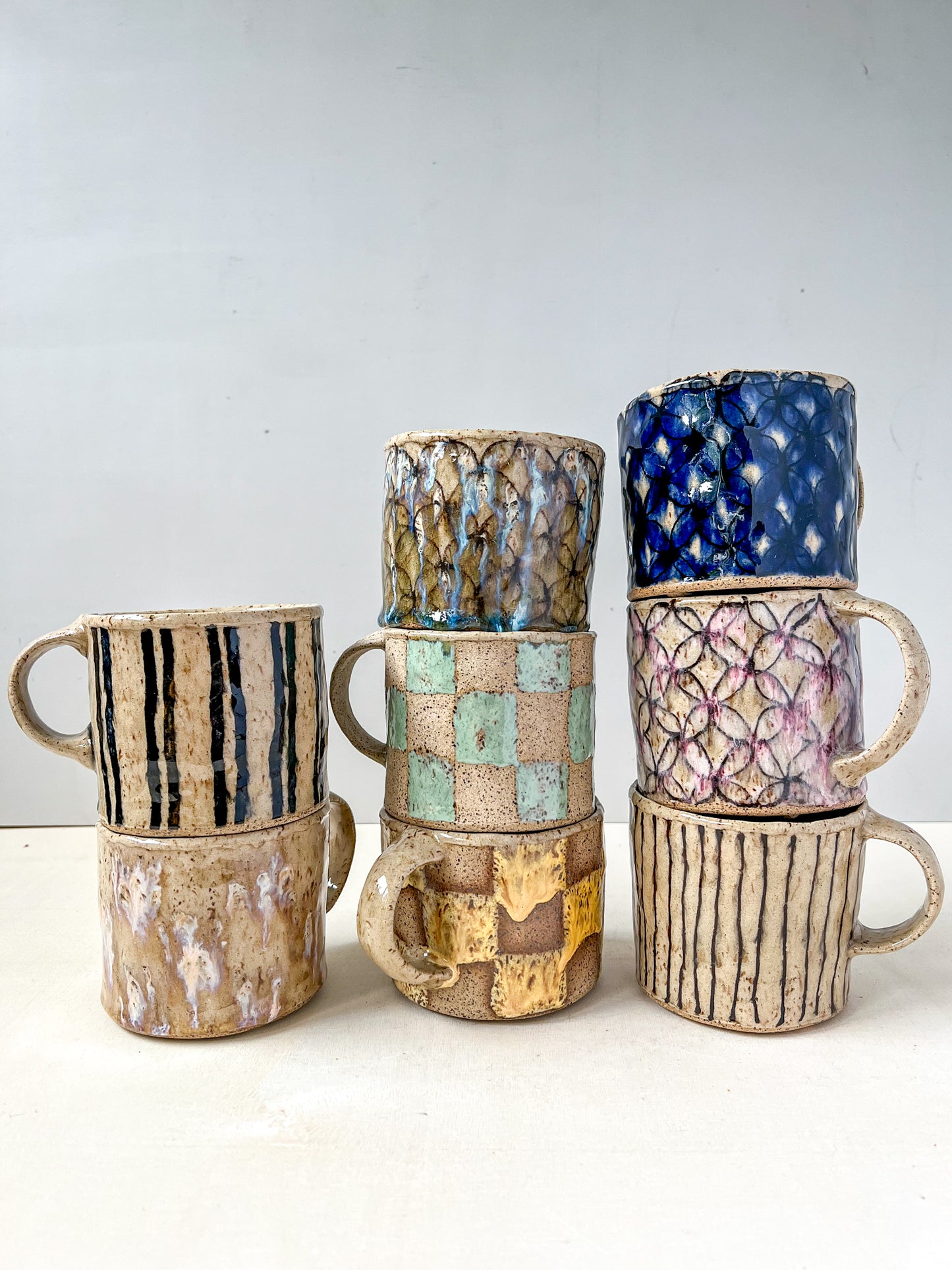 checkered + speckled sunset mug