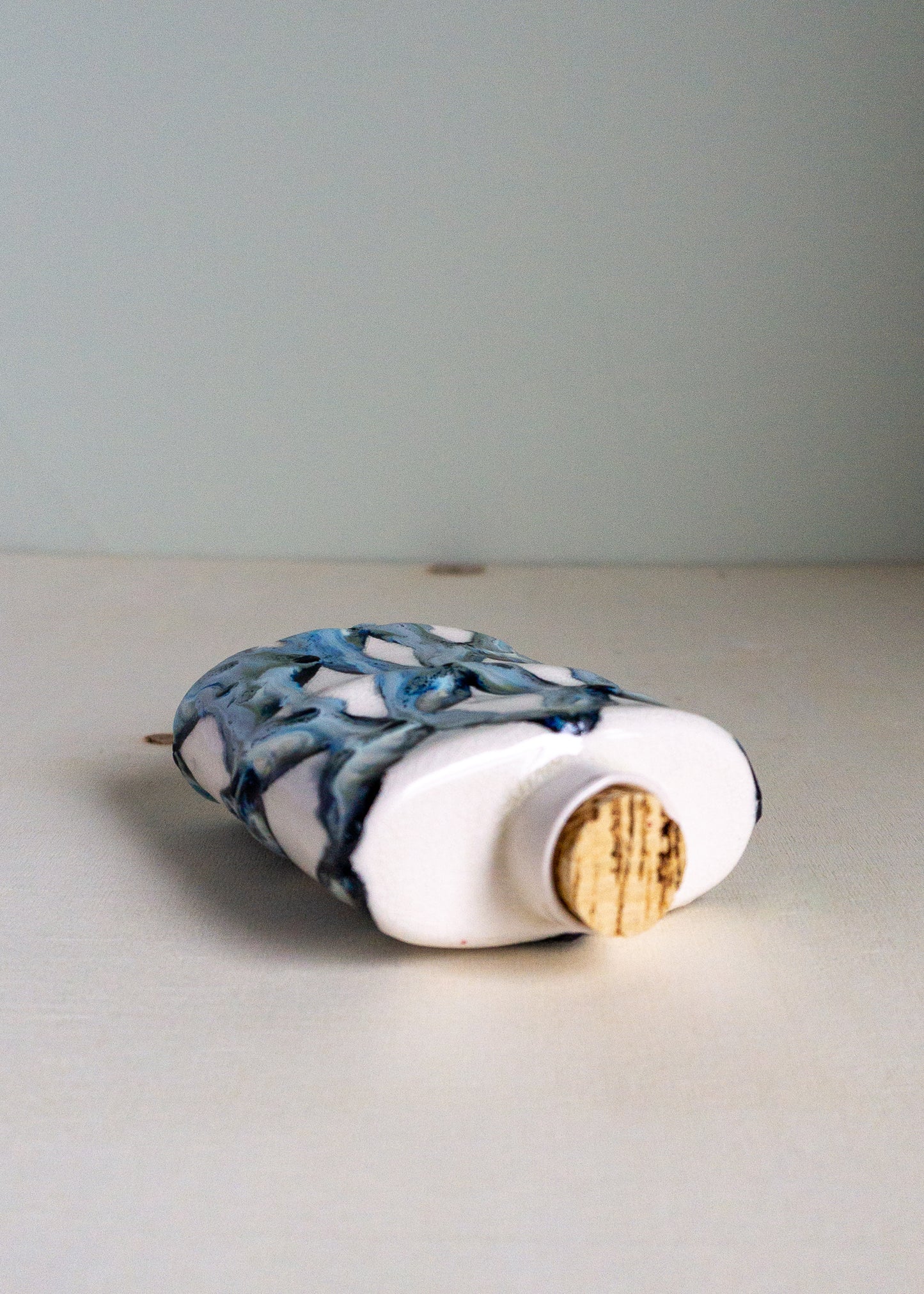 blue patterned flask