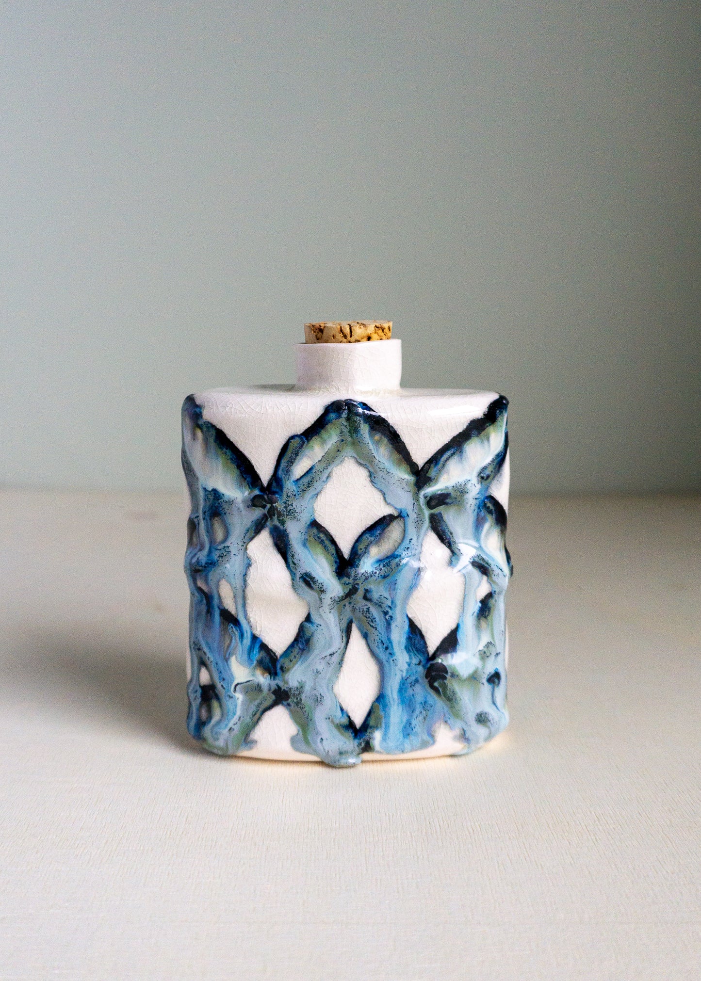 blue patterned flask