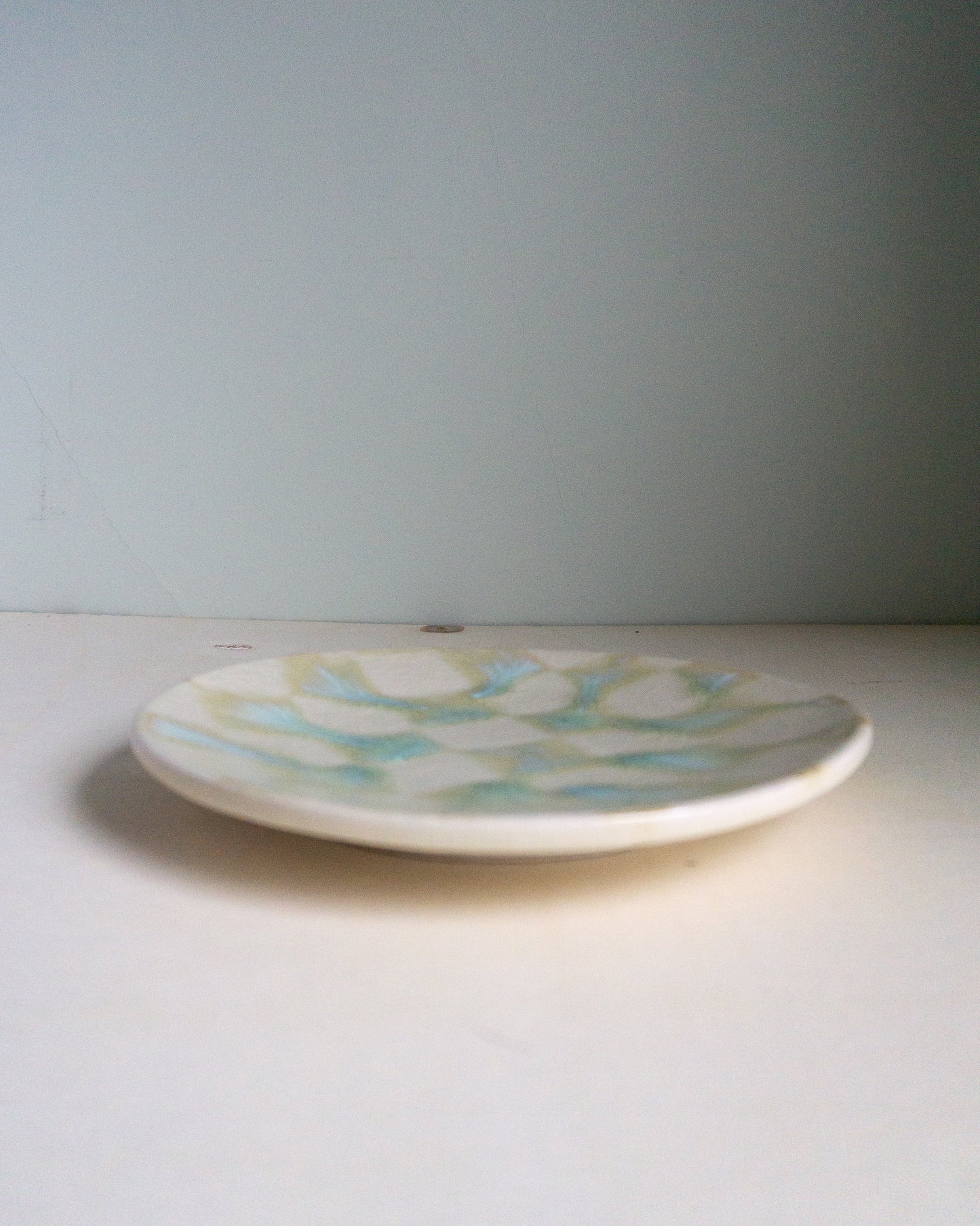 blue-green checkered plate
