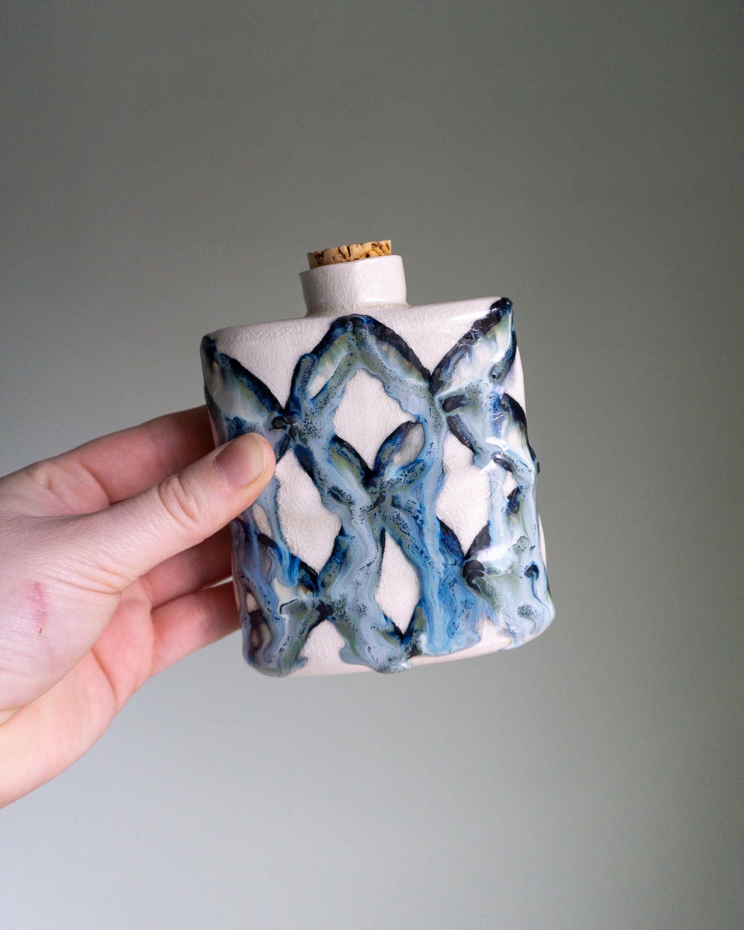 blue patterned flask