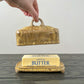 runny yellow speckled butter dish