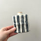 black + white twin stripes flask