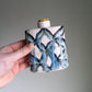 blue patterned flask