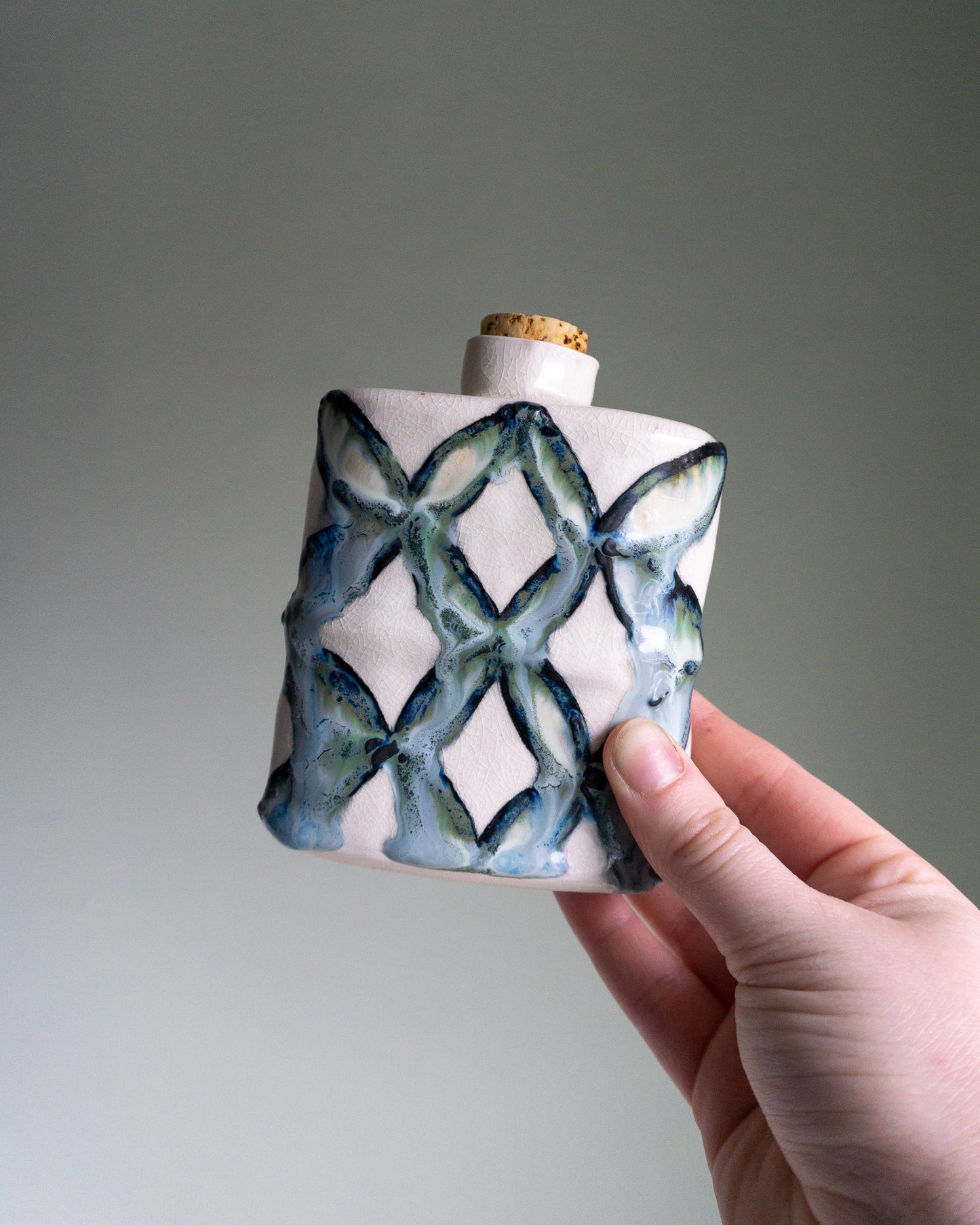 blue patterned flask
